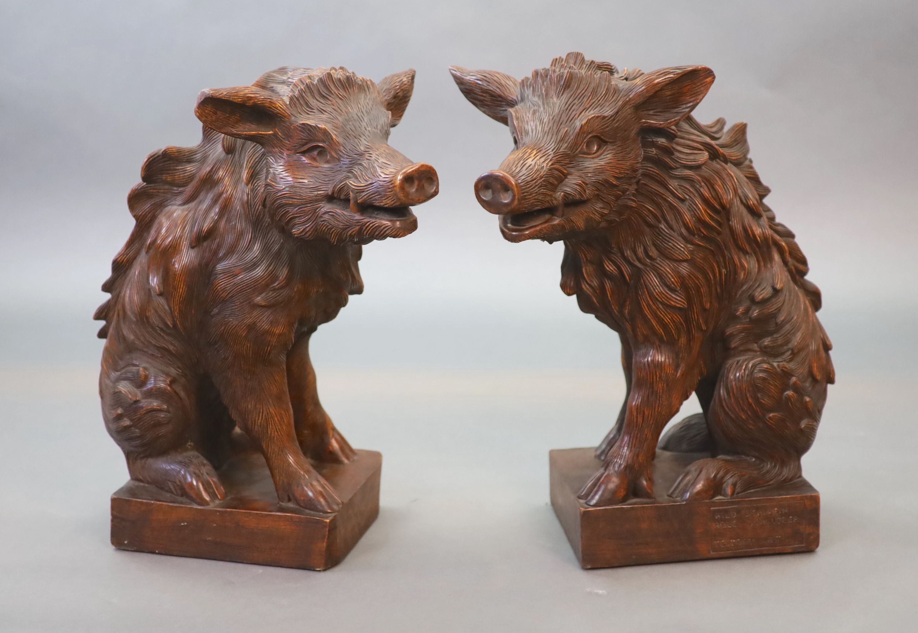 After Pietro Tacca (1577-1640), a pair of early 20th century walnut carvings 42cm wide, 55cm high (maximum)